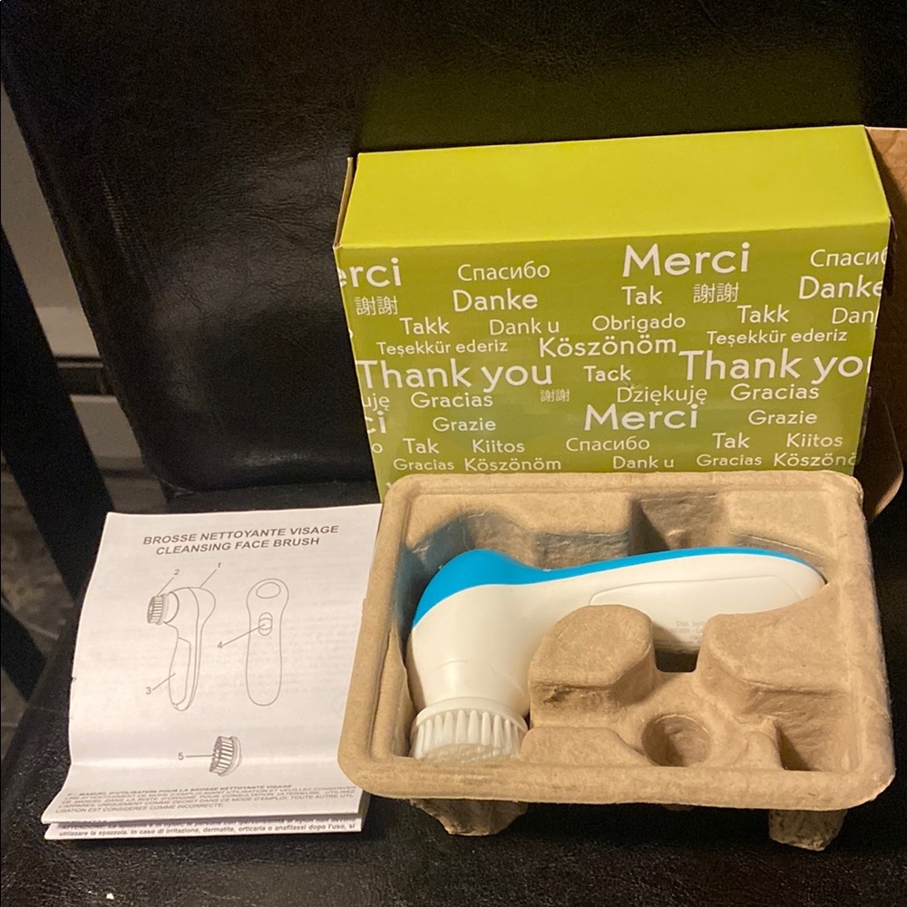 Electric Face Cleansing Brush with Blue Accents
